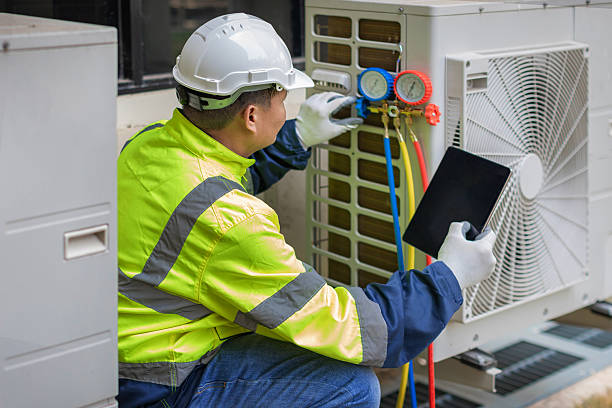 Professional Emergency Ac Repair technician working in Woodleaf, NC